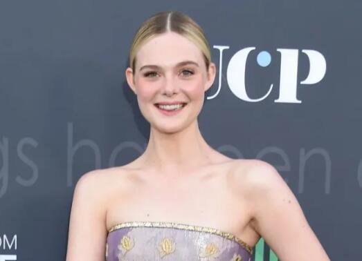 Elle Fanning Toasts Her Career in Draped Black Dress and Studded Heels at American Cinemathique Retrospective