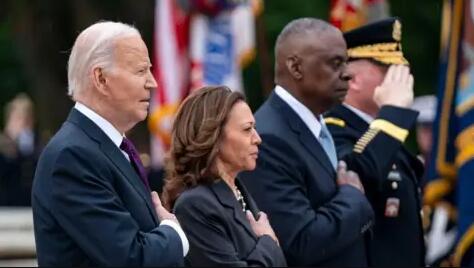 Biden says US troops fight to protect democracy